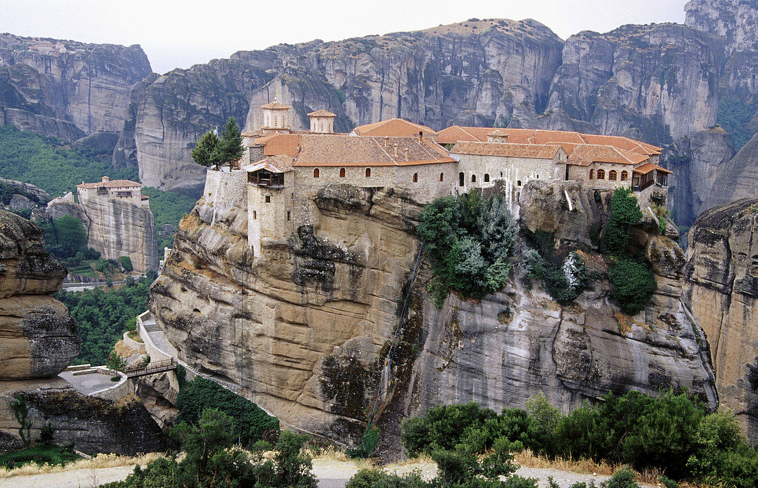 Varlaam (All Saints) Monastery and Roussanou Monastery (at the background). Meteora. Thessaly, Greece