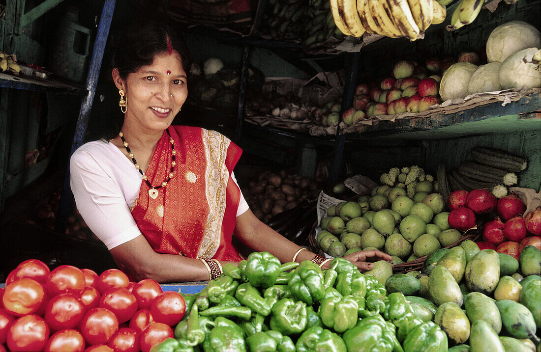 Fruit seller. The Mall. Almora. Kumaon, Himalaya. Uttar Pradesh. India.