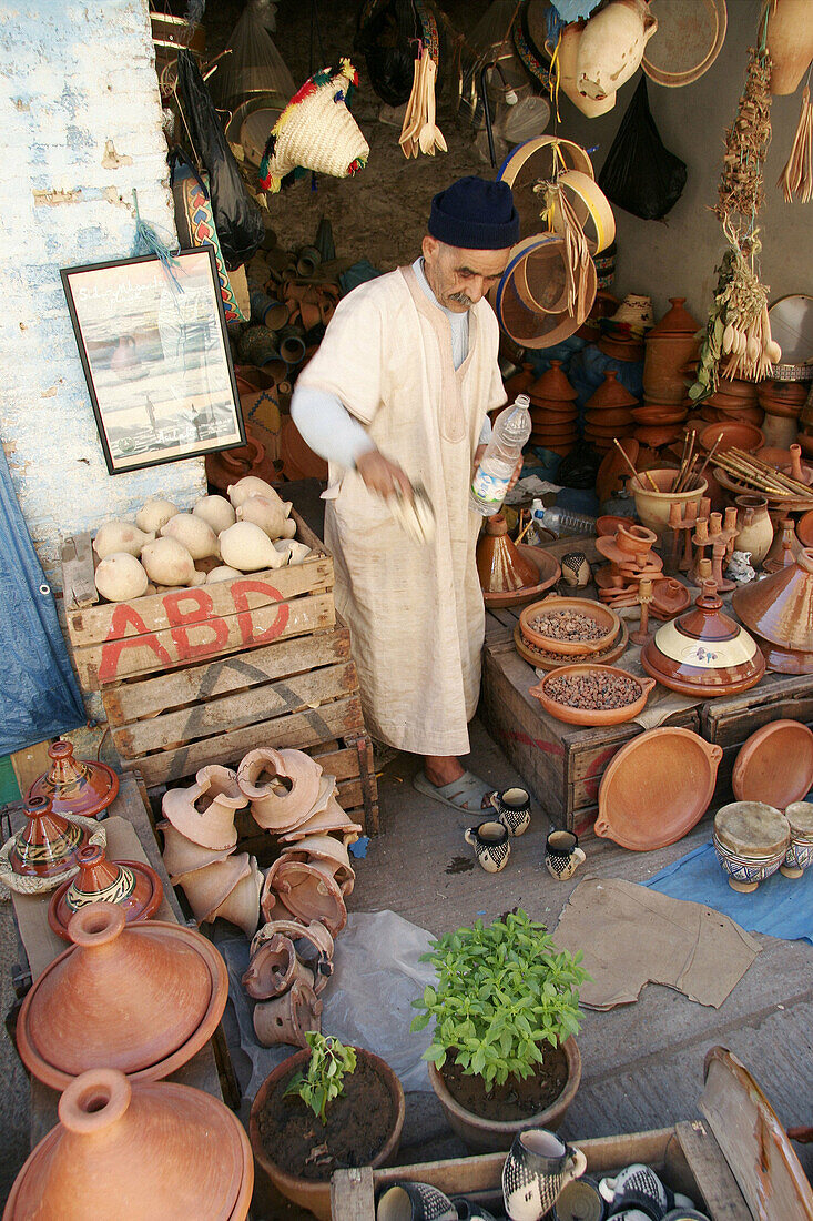 Salesman in shop. Asilah. Morocco.