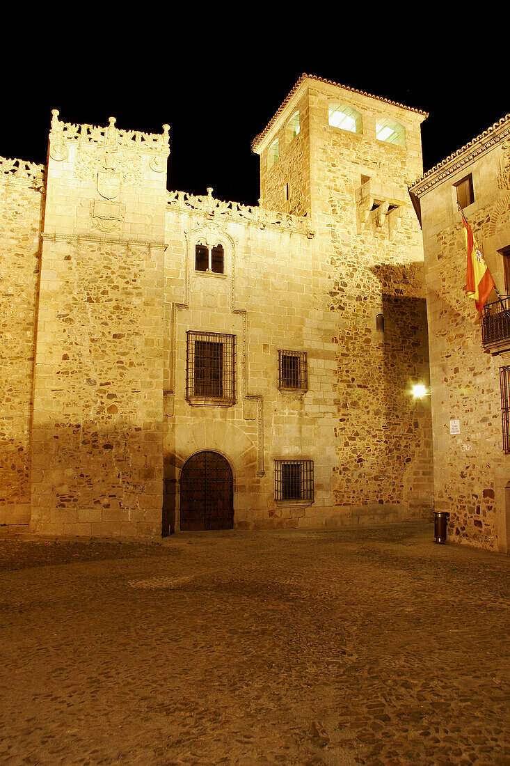 Night view of Palacio de los Golfines de Abajo (13th-14th century), Cáceres. Extremadura, Spain