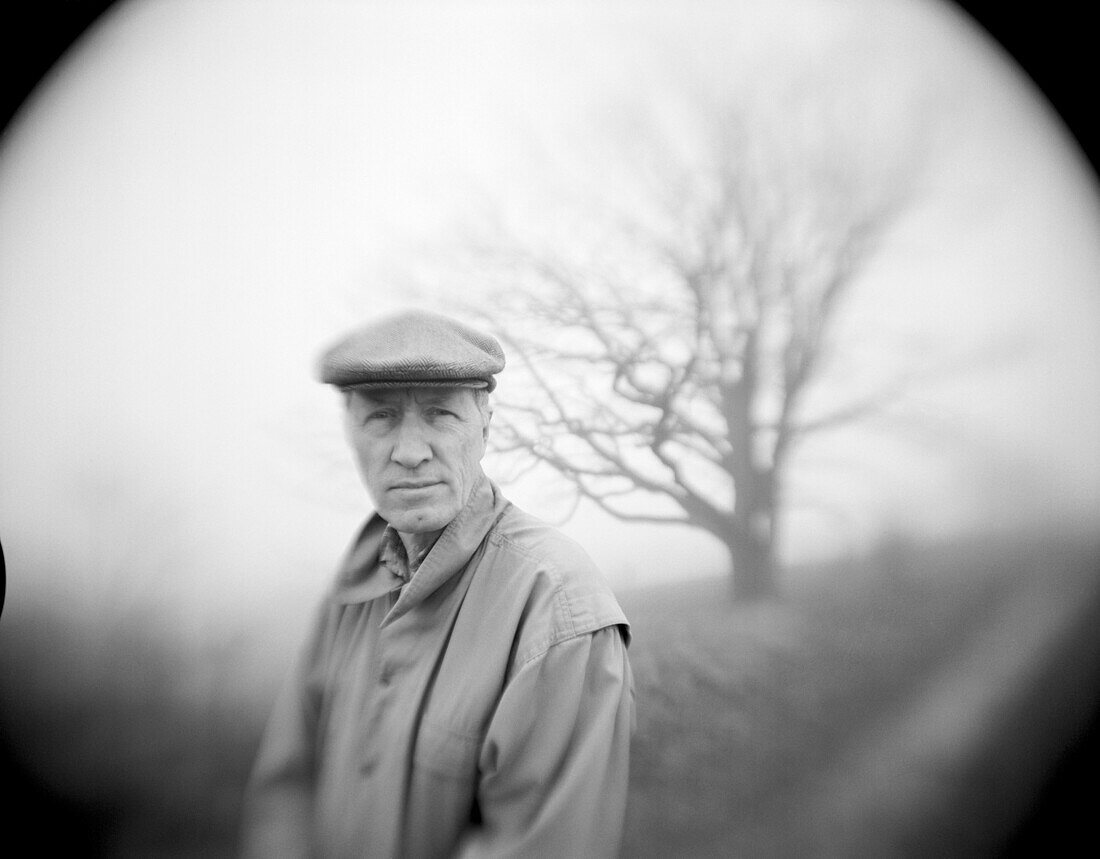 old, Coldness, Contemporary, Country, Countryside, Exterior, Fog, Headgear, Horizontal, Human, Humidity, Mature Adult, Mature Adults, Mature people, Medium-shot, Mist, Misty, Monochromatic, Monochrome