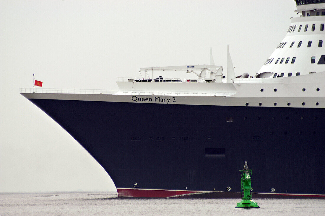 Queen Mary 2 on the Elbe River departing Hamburg. Germany