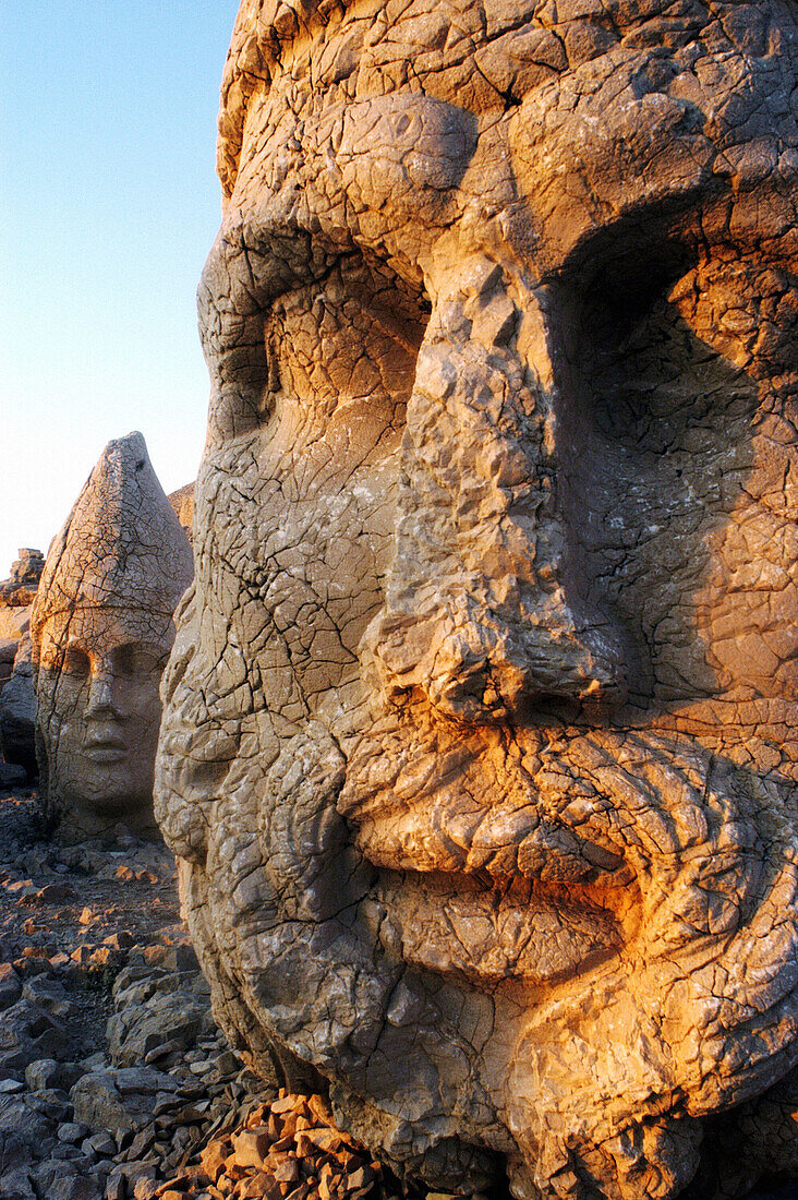 Colossal heads of Zeus and Antiochus I at the Hierothesion, remains in Nemrut Dag (Mount Nemrut, 2150m) part of the former Commagene kingdom. Anatolia. Turkey