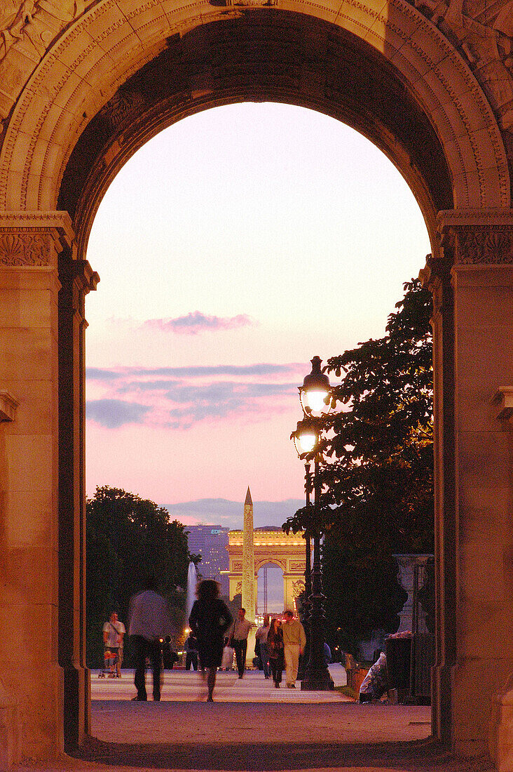 Obelisk and Arc de Triomphe seen from the Arc de Triomphe du Carrousel. Paris. France