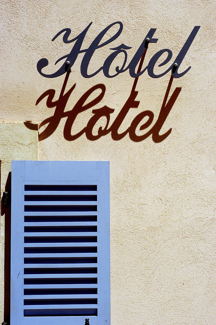 Hotel sign and blue shutter. Cassis. Riviera. France