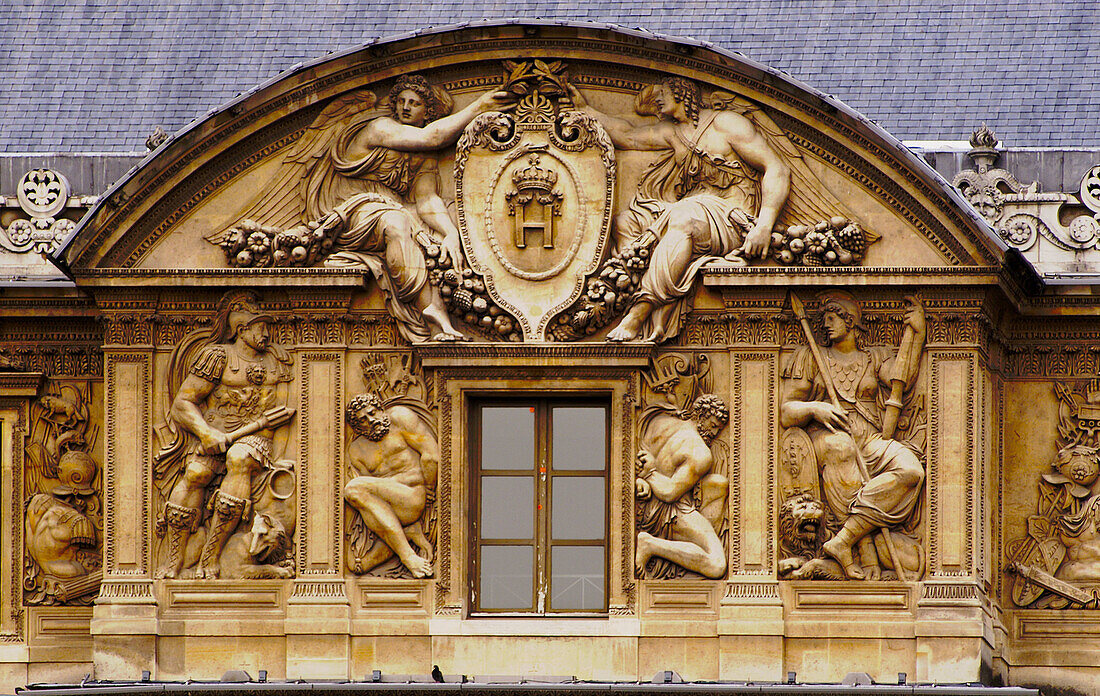 Sculpted reliefs in the Cour Carrée. Louvre Museum. Paris. France