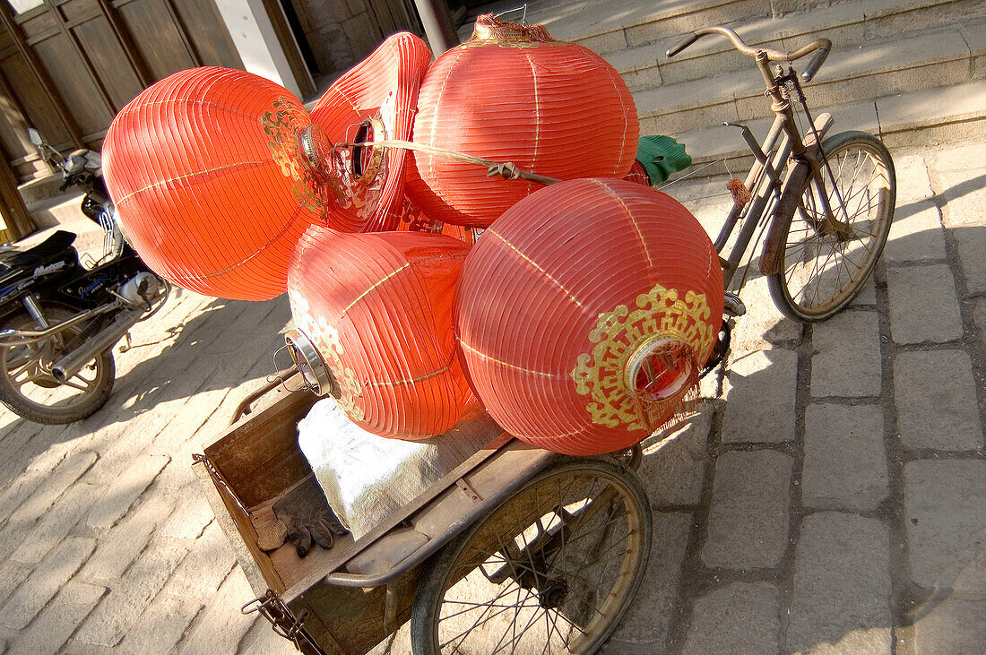 Bicycle carrying lanterns. Tongli. China