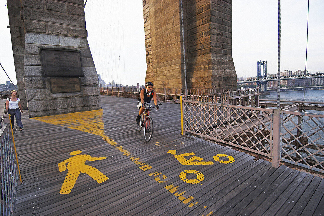 Lanes for pedestrians and bikers on the Brooklyn Bridge. New York City. New York. United States