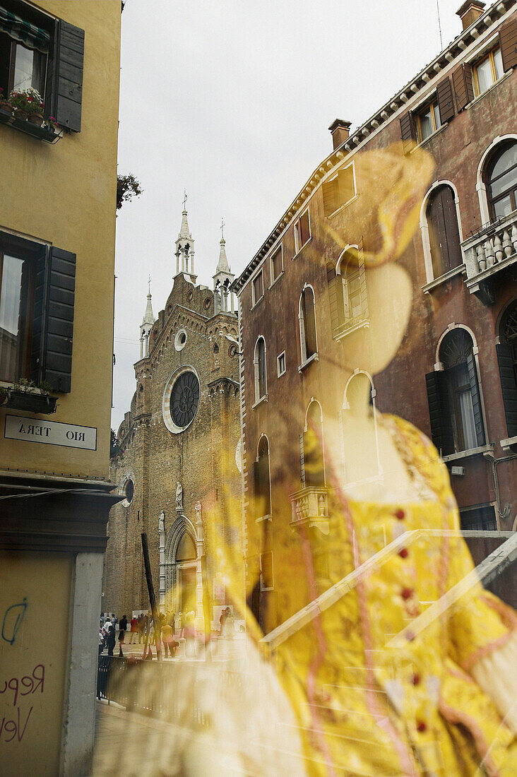 Costume shop window and reflection. Venice. Italy