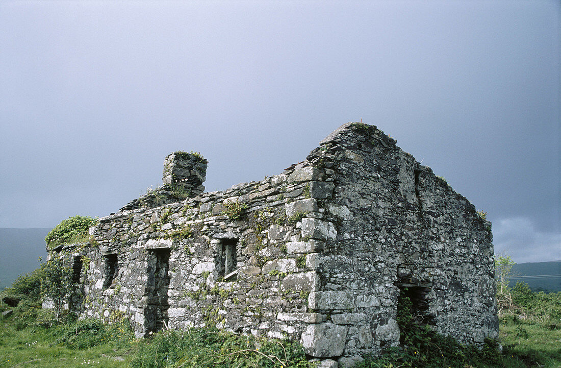 Abandoned rock wall building without roof. County Kerry. Ireland