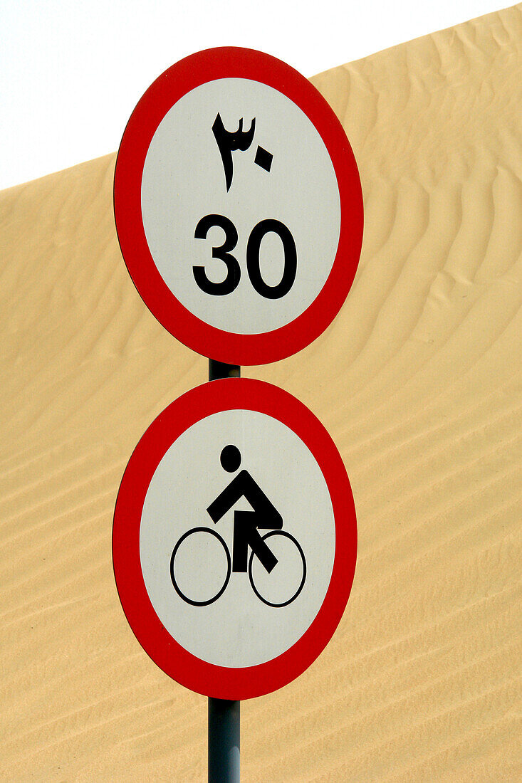 Warning Sign and sand dune, Dubai, United Arab Emirates, UAE