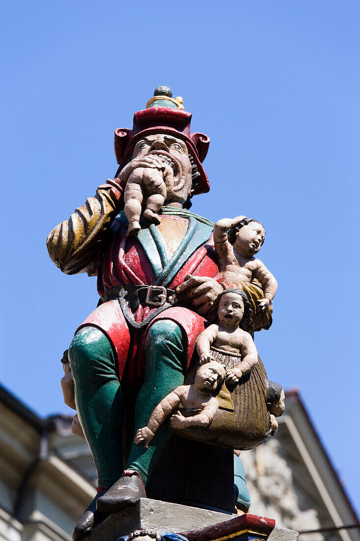 Sculpture of an ogre eating a child, Kindlifresserbrunnen, Kornhausplatz, Old City of Berne, Berne, Switzerland