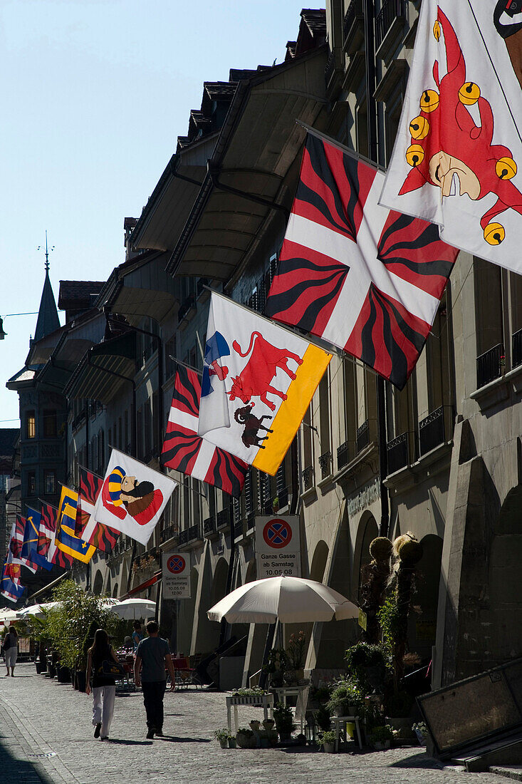 Flags along an alley, Kramgasse, Old City of Berne, Berne, Switzerland