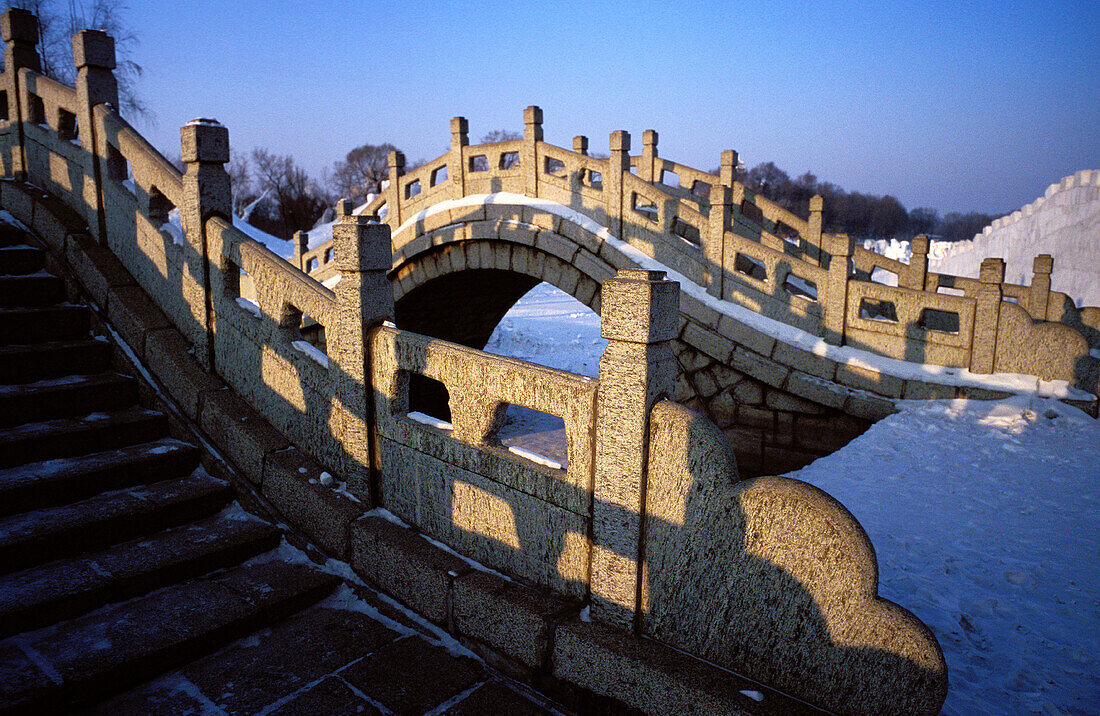 Chinese bridges over frozen river