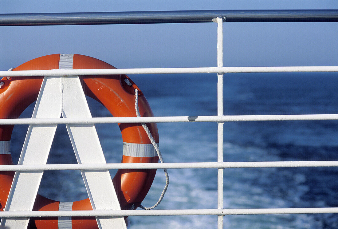 Life-belt at ferry. North Sea, North Germany