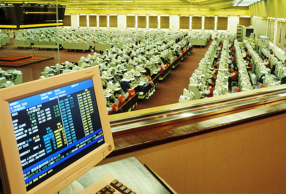 Inside Hong Kong Stock Exchange with trading floor. Hong Kong Island, Hong Kong. China