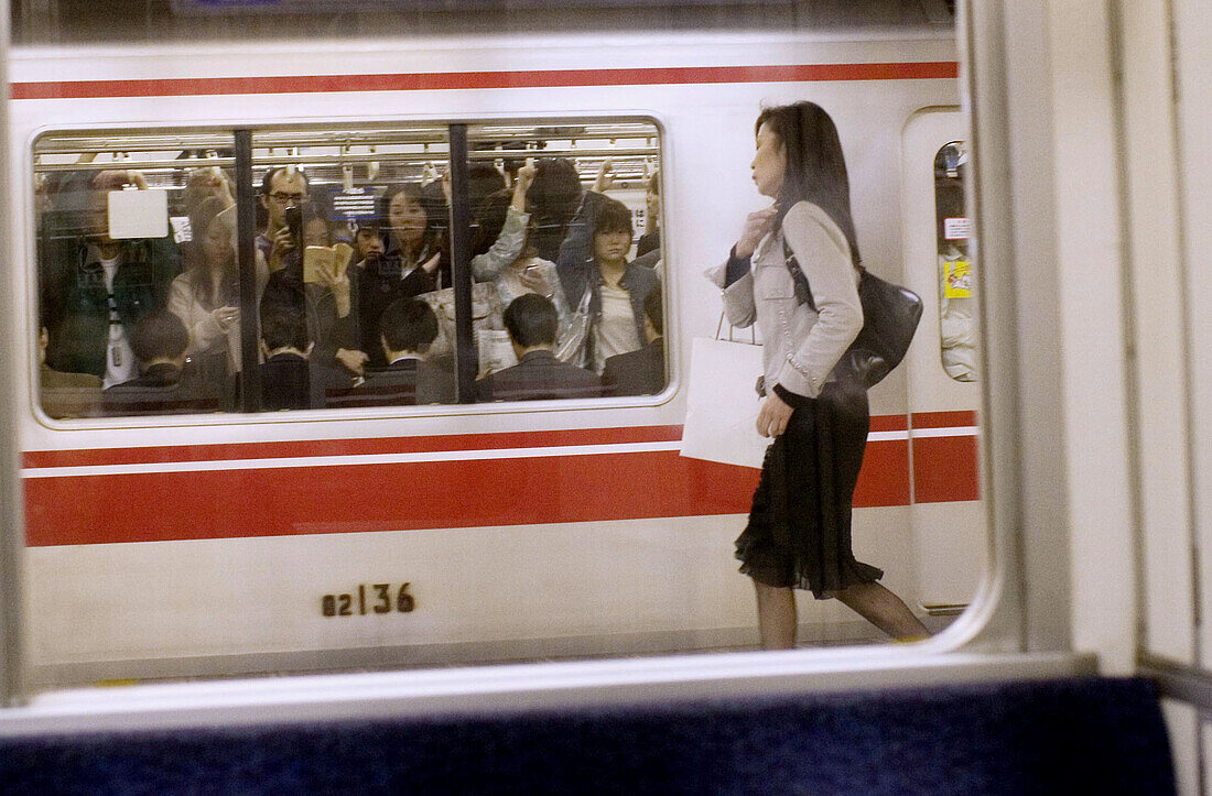  Asia, Asian, Asians, Business attire, Color, Colour, Commuter, Contemporary, Crowded, Ethnic, Ethnicity, Horizontal, Human, Indoor, Indoors, Interior, Japan, Motion, Movement, Moving, Open, Passenger, Passengers, People, Person, Persons, Platform, Platfo