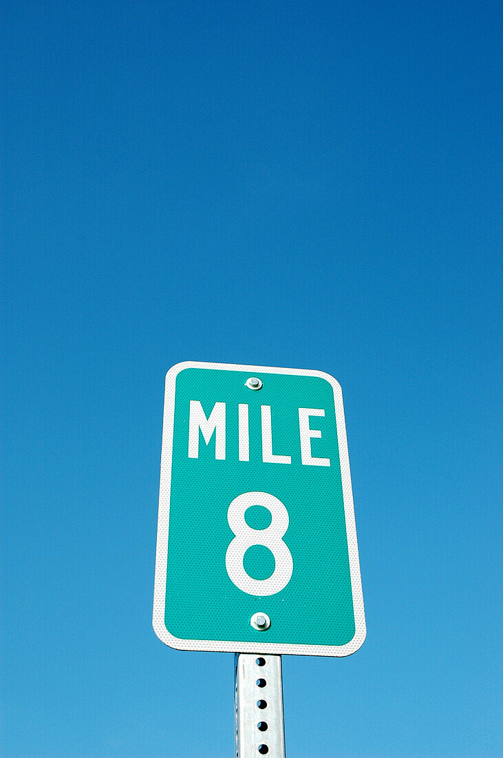 8 eight mile distance marker sign on freeway highway