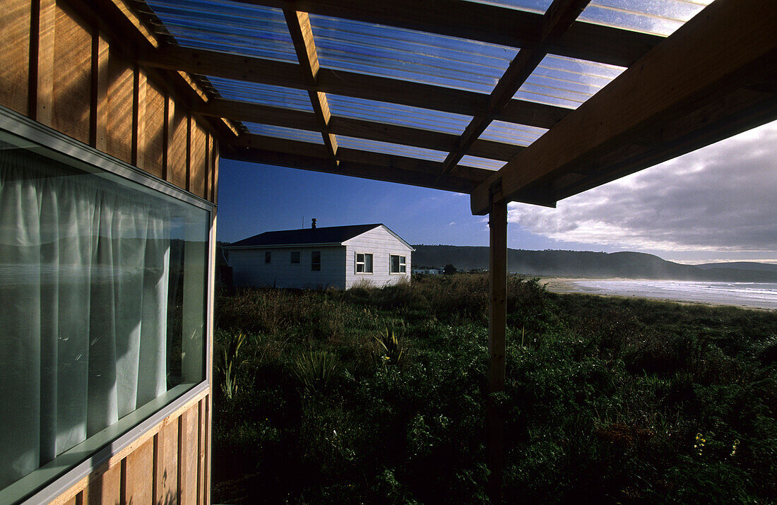 Ferienhäuser an der Curio Bay, Catlin Küste, Neuseeland