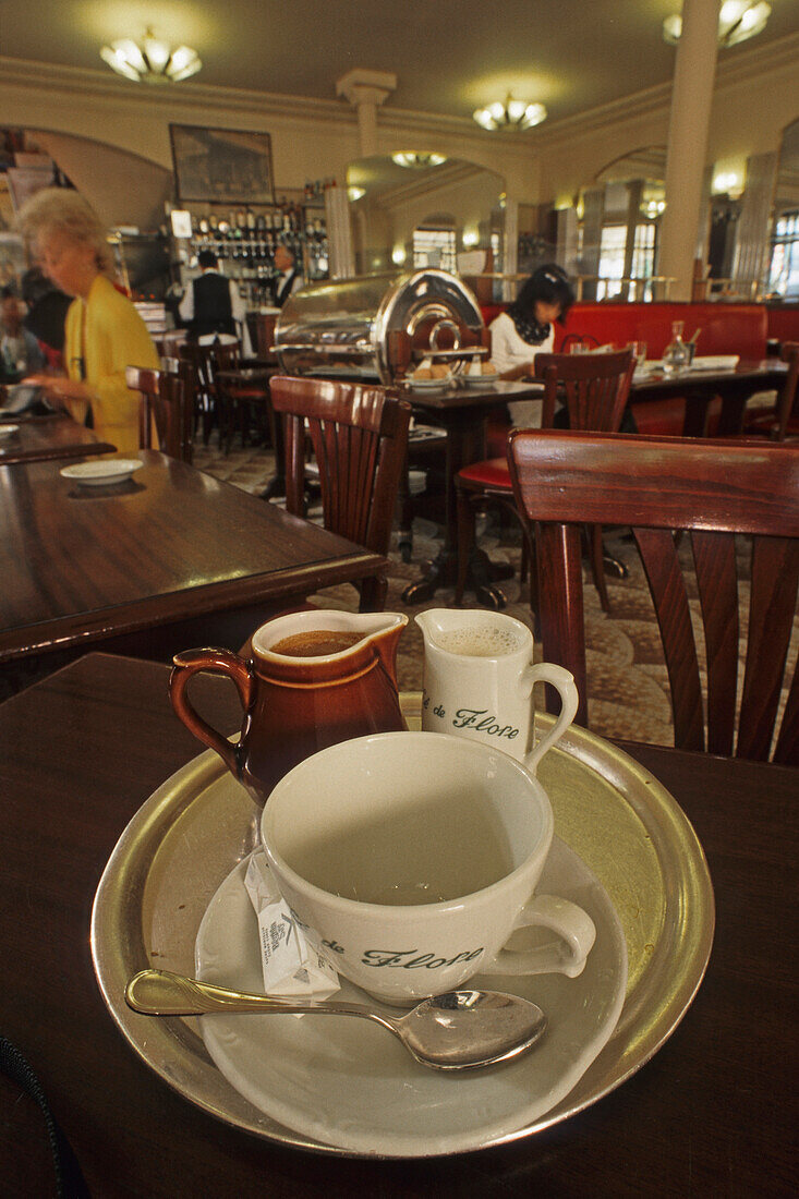 A cup of coffee with a milk jug, Café au lait, Café de Flore, Boulevard Saint Germain, Paris, France
