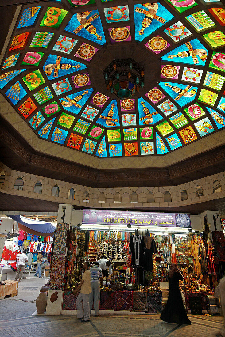 Oman Muscat Mutrah Souk Souvenir Shop with handicraft, colorful ceiling