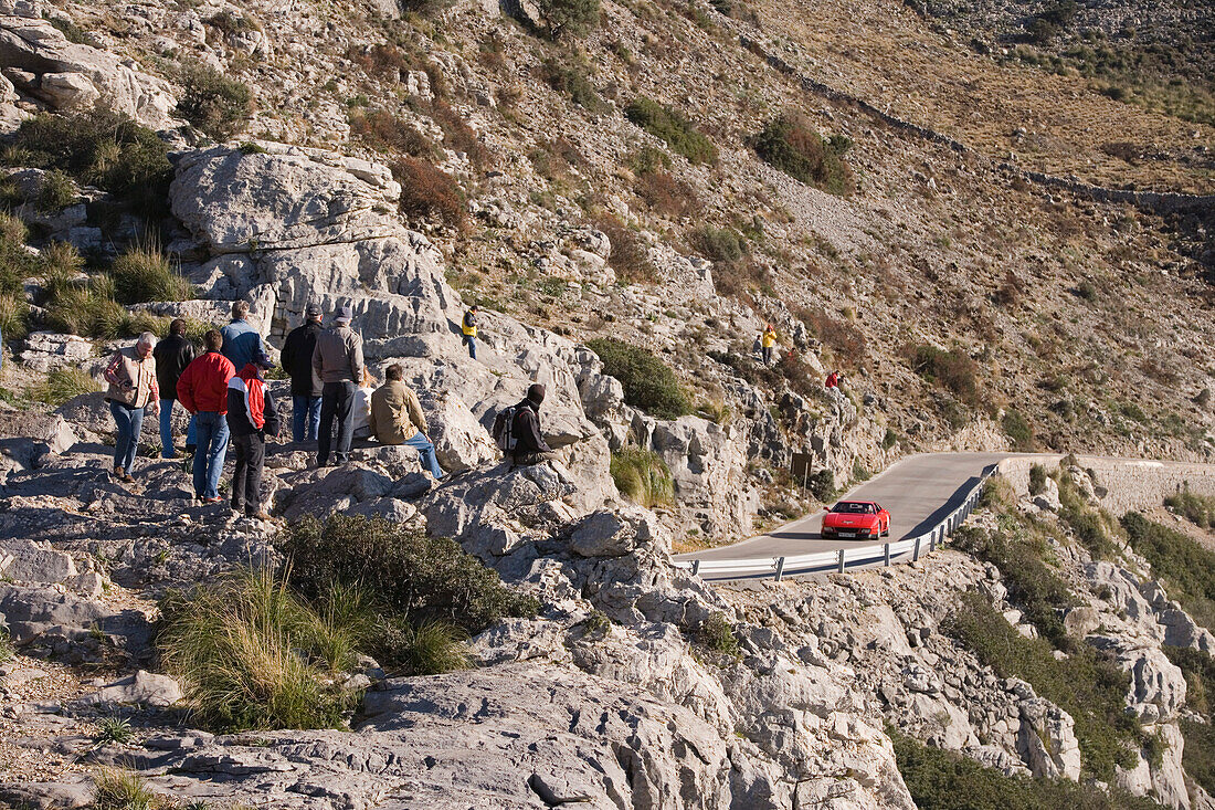 Spectators and Ferrari on Sa Calobra Mountain Road, Rally Classico Isla Mallorca, near Cala de Sa Calobra, Mallorca, Balearic Islands, Spain