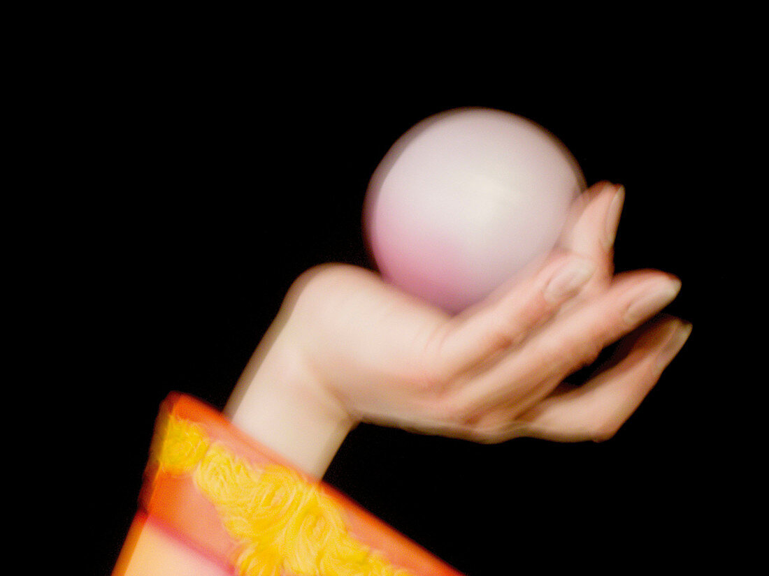 Ability, Adult, Adults, Allegory, Balance, Ball, Balls, Blurred, Close up, Close-up, Closeup, Color, Colour, Contemporary, Control, Controlling, Detail, Details, Dexterity, Domination, Equilibrium, Female, Hand, Hands, Hold, Holding, Horizontal, Human, In