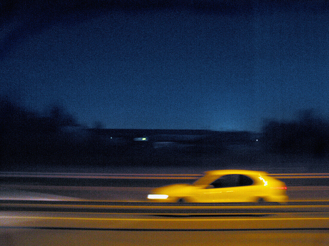 Auto, Automobile, Automobiles, Autos, Blurred, Car, Cars, Color, Colour, Contemporary, Exterior, Fast, Highway, Highways, Horizontal, Night, Nighttime, One, Outdoor, Outdoors, Outside, Road, Roads, Single, Special effects, Speed, Thoroughfare, Thoroughfar