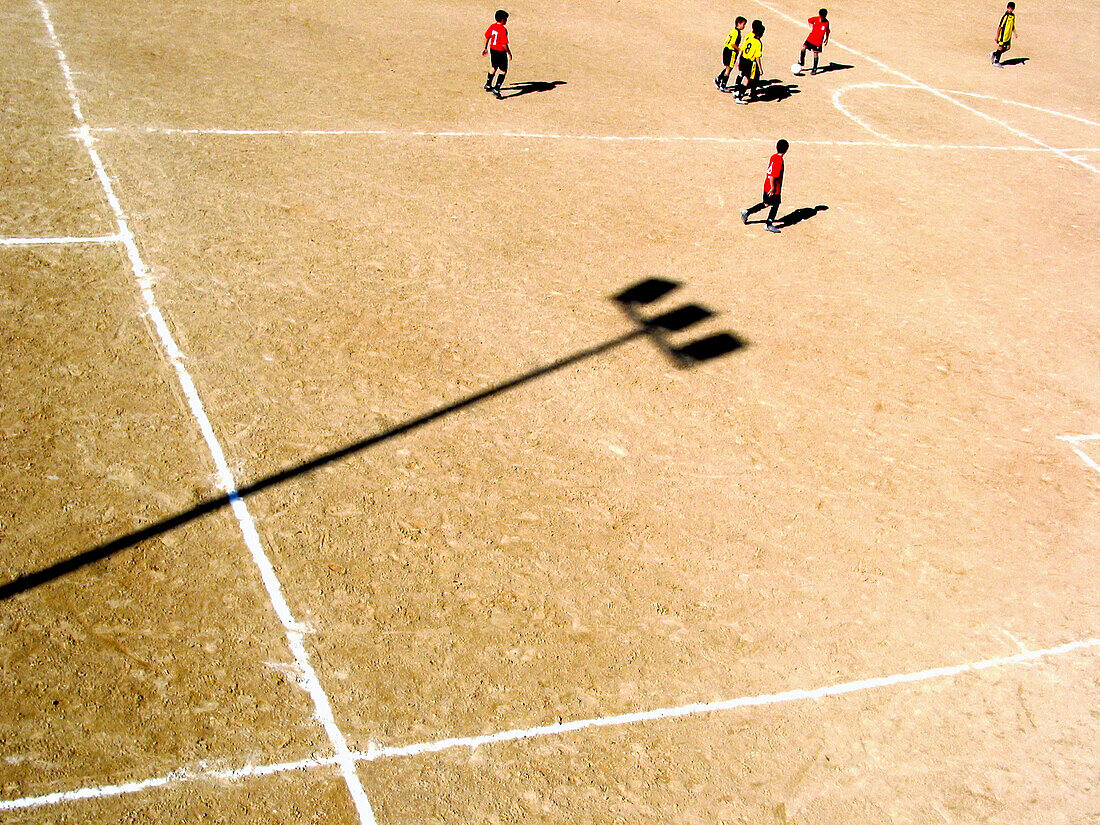 Activity, Color, Colour, Comunidad Valenciana, Contemporary, Daytime, Earth, Europe, Exterior, Football, Football ground, Game, Games, Horizontal, Human, Leisure, Match, Matches, Outdoor, Outdoors, Outside, People, Person, Persons, Player, Players, Shadow