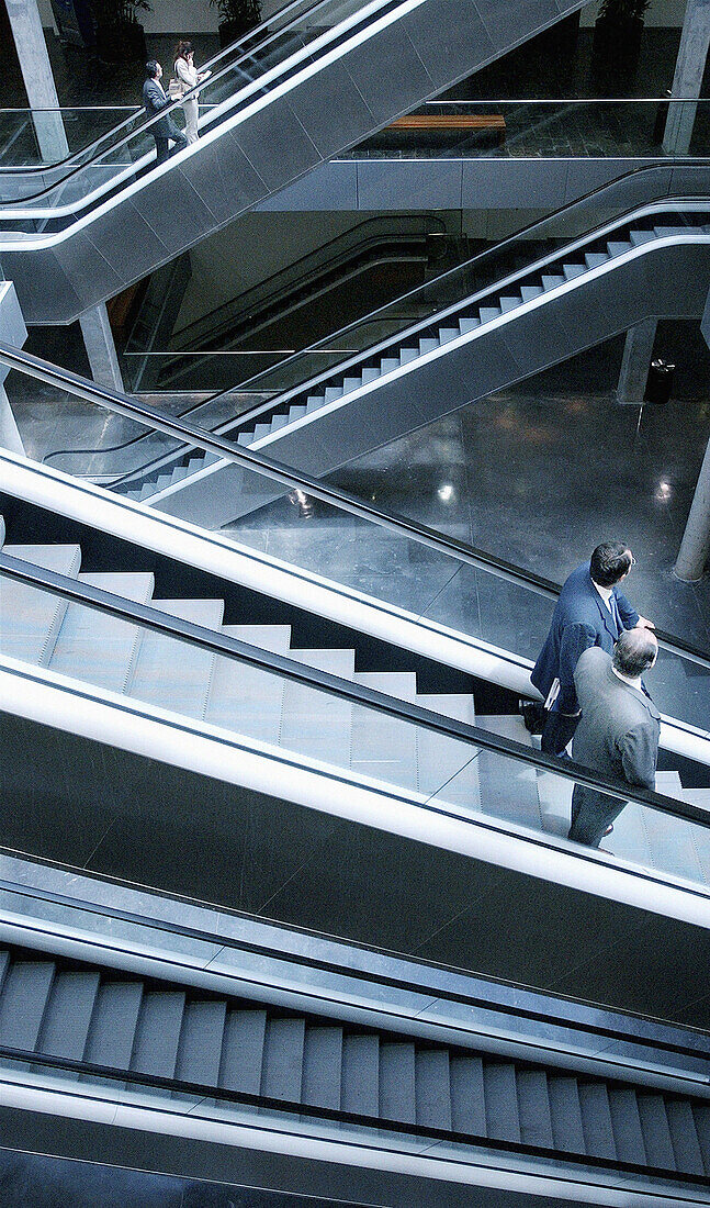 People on escalators