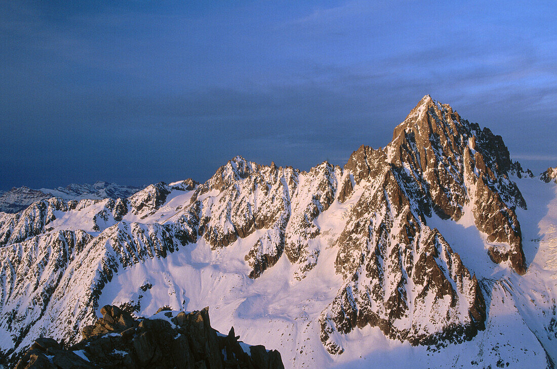Aiguille du Chardonnet (3824 m.) in evening light, winter, Alps. Chamonix, France