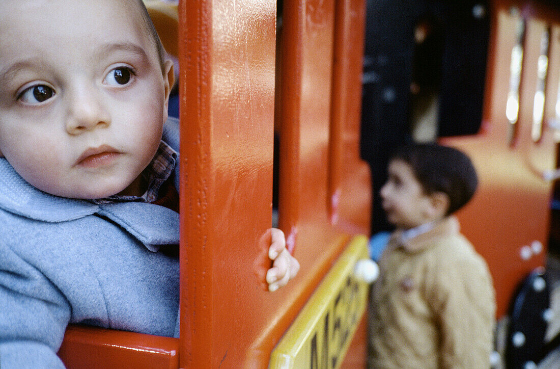 ose up, Close-up, Closeup, Color, Colour, Contemporary, Daytime, Exterior, Face, Faces, Fair, Fairground, Fairs, Funfair, Funfairs, Headshot, Headshots, Human, Infantile, Innocence, Innocent, Kid, Kid