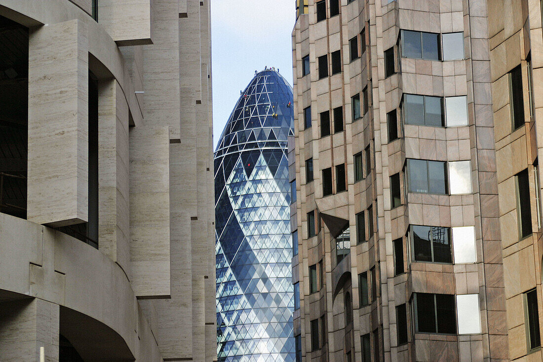 Swiss Re building and other modern building. The City. London. England