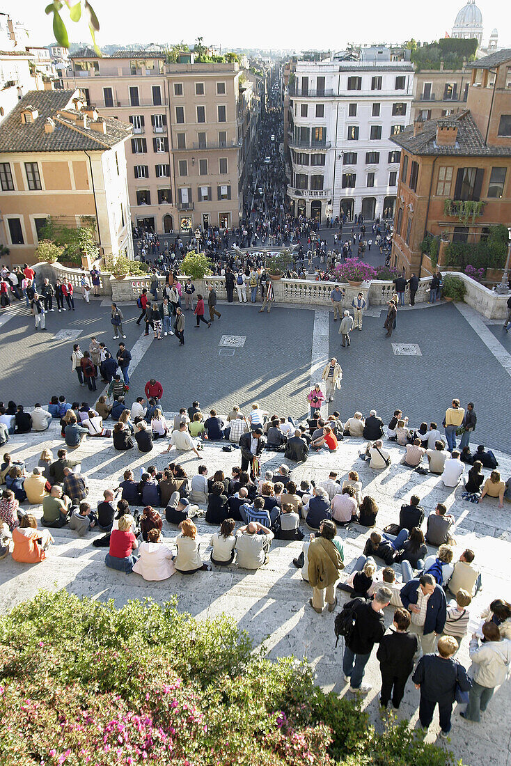 Tourists on the stairs of the Trinità dei Monti church. Piazza di Spagna. Rome. Italy