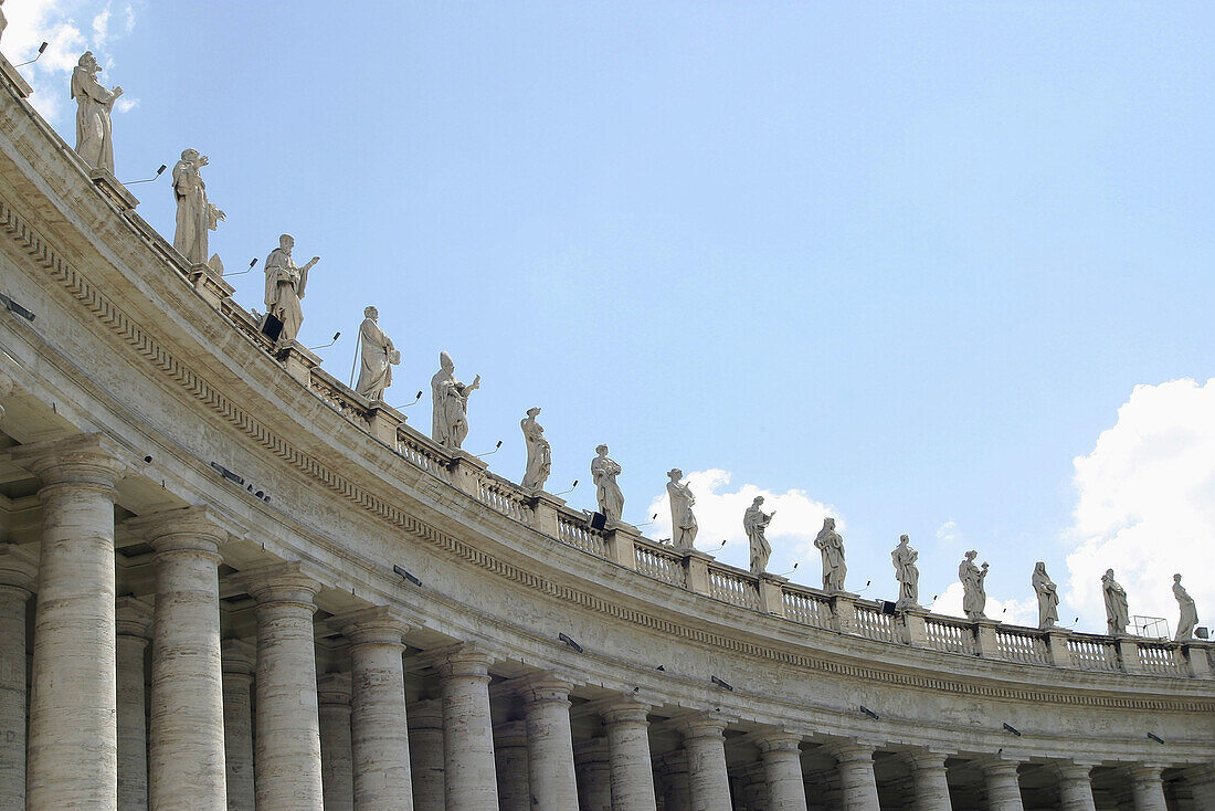 Colonnade crowned by statues. St. Peters Square. Vatican City. Rome. Italy