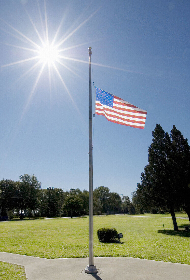  4th of July, America, American flag, Americana, Blue, Blue sky, Color, Colour, Concept, Concepts, Countries, Country, Daytime, Exterior, Flag, Flag at half-mast, Flag at half-staff, Flagpole, Flagpoles, Flags, Flags at half-staff, Fourth of July, Grass, 