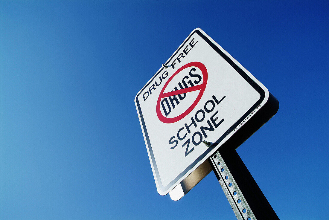 Street sign advises that this is a drug free school zone