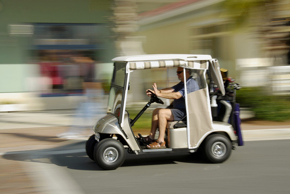Golf carts are the main transportation at The Villages is a retirement community near Orlando and Ocala Florida developed for active senior citzens to provide a full range of activities for a couple in retirement
