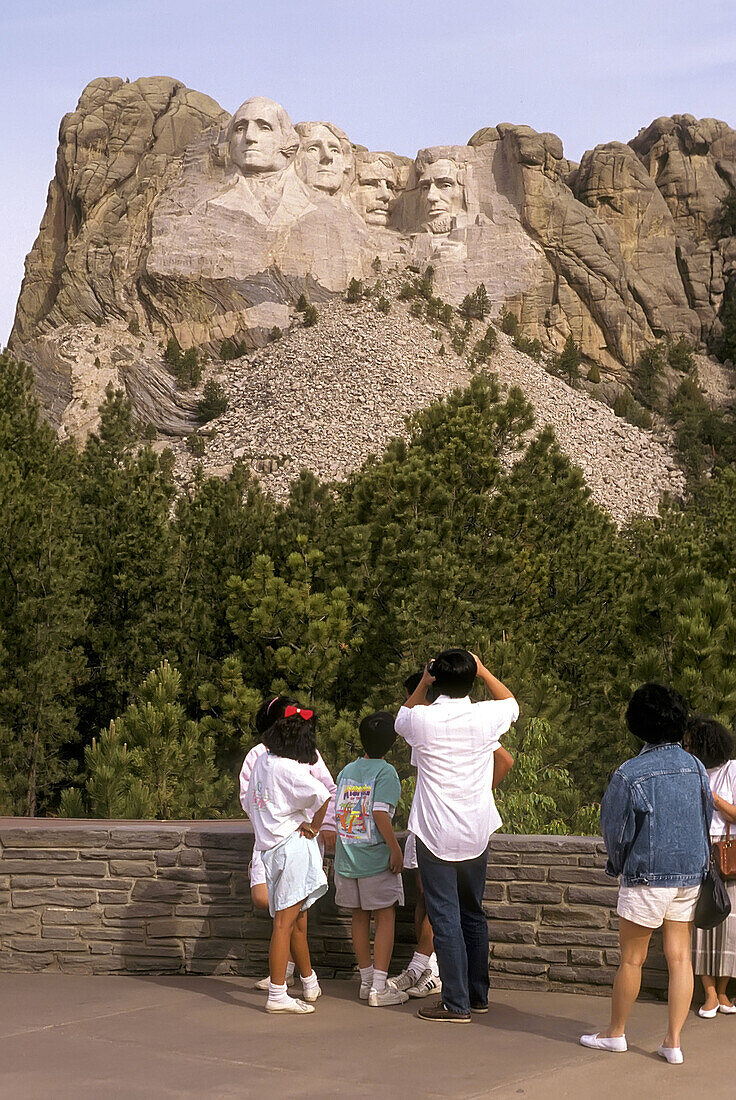 Family visits Mount Rushmore National Park South Dakota. USA.