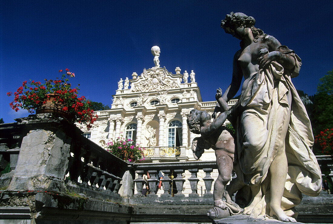 View at statues in front of Linderhof castle in the Graswang Valley, Bavaria, Germany