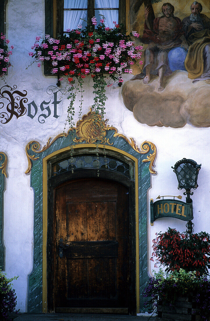 House decorated with traditional painting Lüftlmalerei in the village of Wallgau, Bavaria, Germany