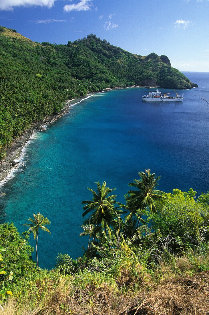The freighter Aranui III anchoring in the Bay of Hapatoni off the island of Tahuata, French Polynesia