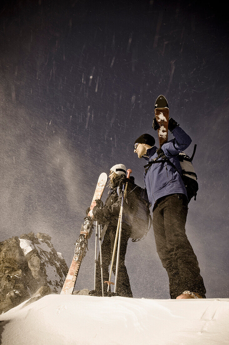 Couple backcountry skiing at Sonnblick range, Hohe Tauern National Park, Rauris, Salzburg (state), Austria