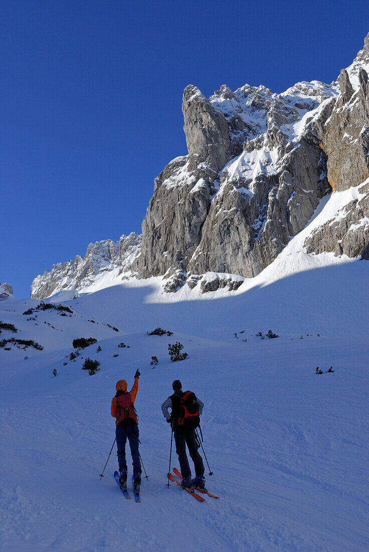 Two backcountry skiers ascending, Griesner Kar, Wilder Kaiser, Kaiser range, Tyrol, Austria