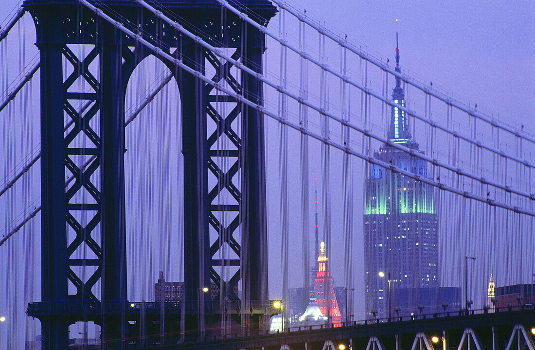 Manhattan Bridge and Empire State Building at night. New York City, USA