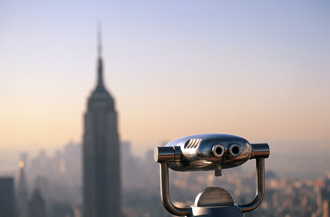 Stationery viewer and Empire State Building, New York City. USA