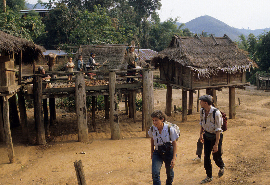 Trekking tourists in Karen village near Chiang Mai, North Thailand, Thailand