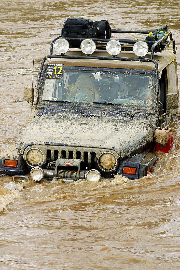 4x4, Adventure, Adventures, Blocked, Central America, Color, Colour, Compete, Competing, Competition, Competitions, Contemporary, Cross, Crossing, Dangerous, Daytime, Exterior, Flood, Flooded, Flooding, Four-wheel drive, Hazard, Jalisco, Latin America, Ma