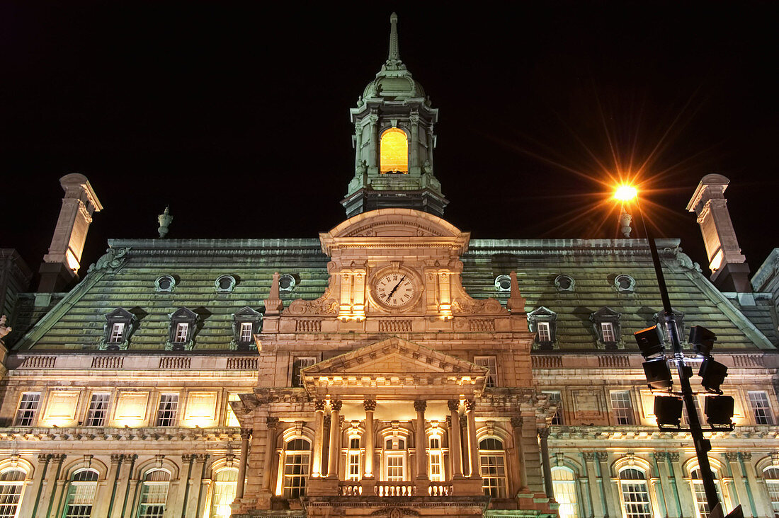 Montreals City Hall (Hotel de Ville) at night. Quebec, Canada