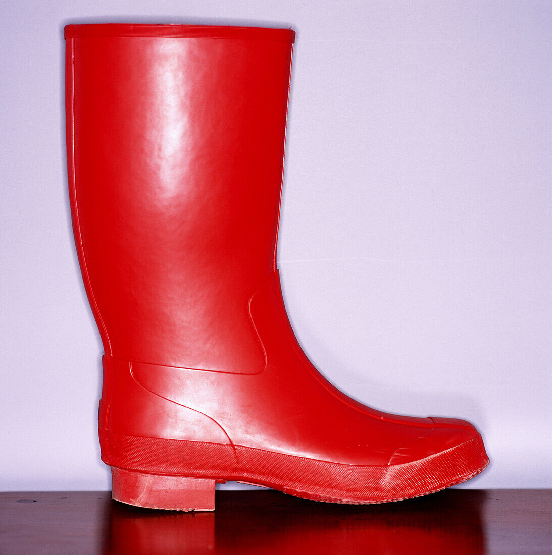 Boot, Boots, Close up, Close-up, Closeup, Color, Colour, Concept, Concepts, Detail, Details, Footgear, Footwear, Galosh, Galoshes, Indoor, Indoors, Inside, Interior, Object, Objects, One, One item, Rain, Rainboot, Red, Rubber boot, Rubber boots, Square, S